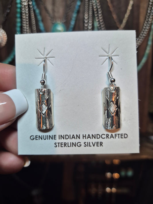 Stamped dangles